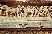 Khajuraho - Lakshmana temple the frieze of the temple base 